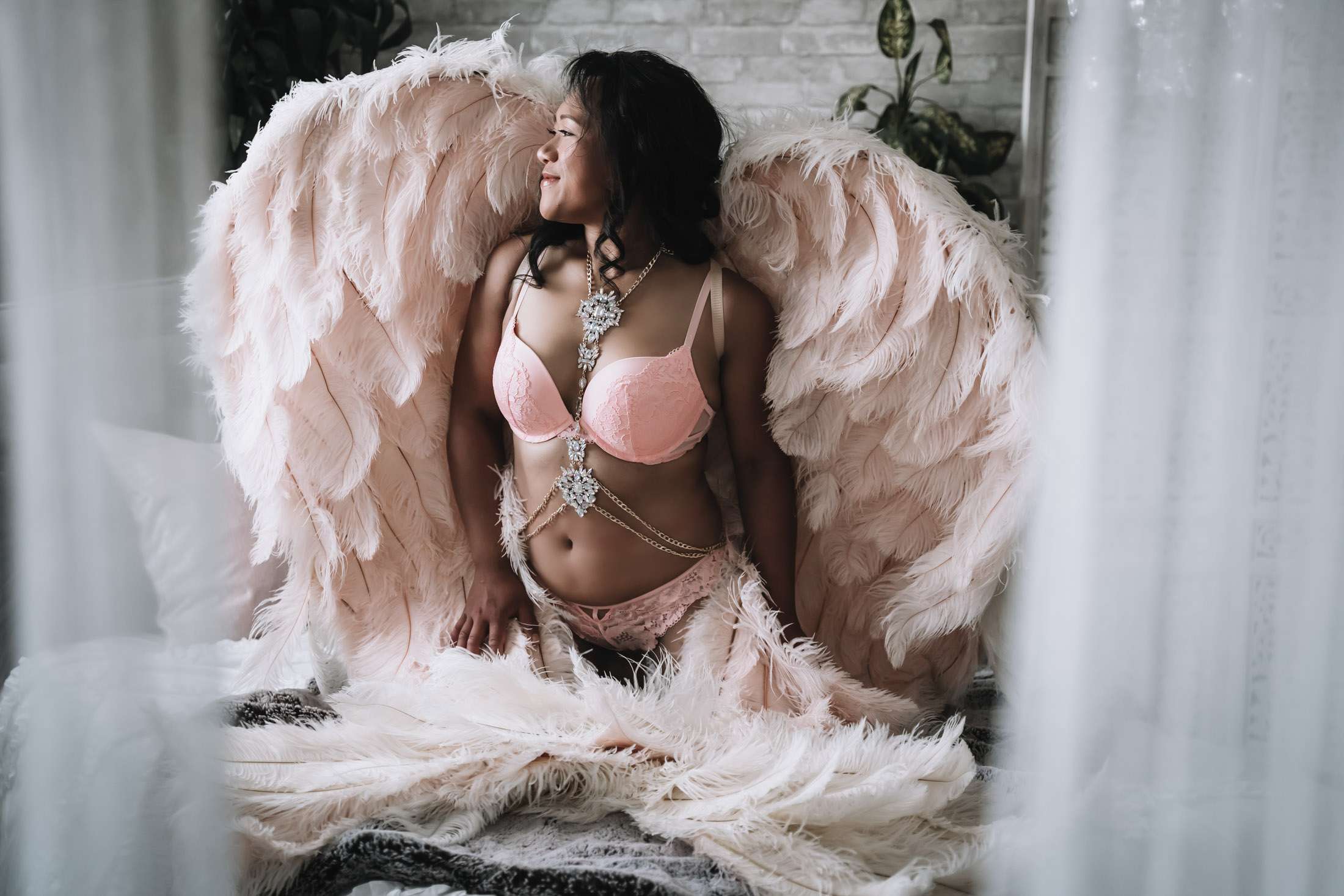 boudoir photography session with angel wings