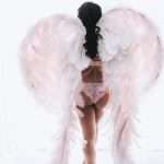 boudoir photography session with angel wings